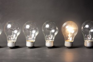 One lit lightbulb in a line of lightbulbs - Vicki Hurley Releasing Truth